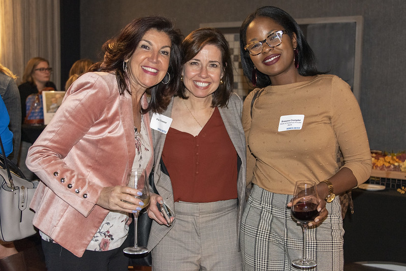 A picture from the Women United Event, showing three Women that are in Women United